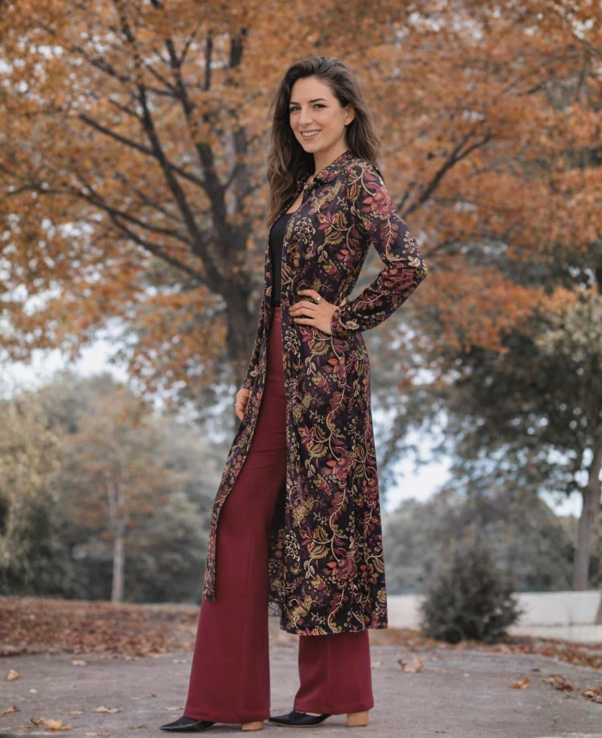 Model wearing the Ruby Velour Vintage Shirt Dress open over pants, styled as a long shirt layer in vintage print velour.