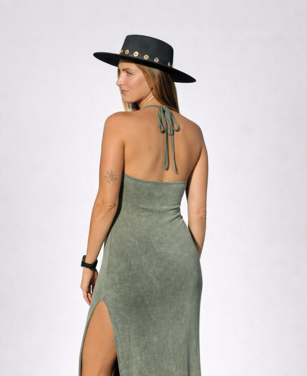 Back detail of Shakira Halter Maxi Dress in sage khaki showing halter ties and straight back
