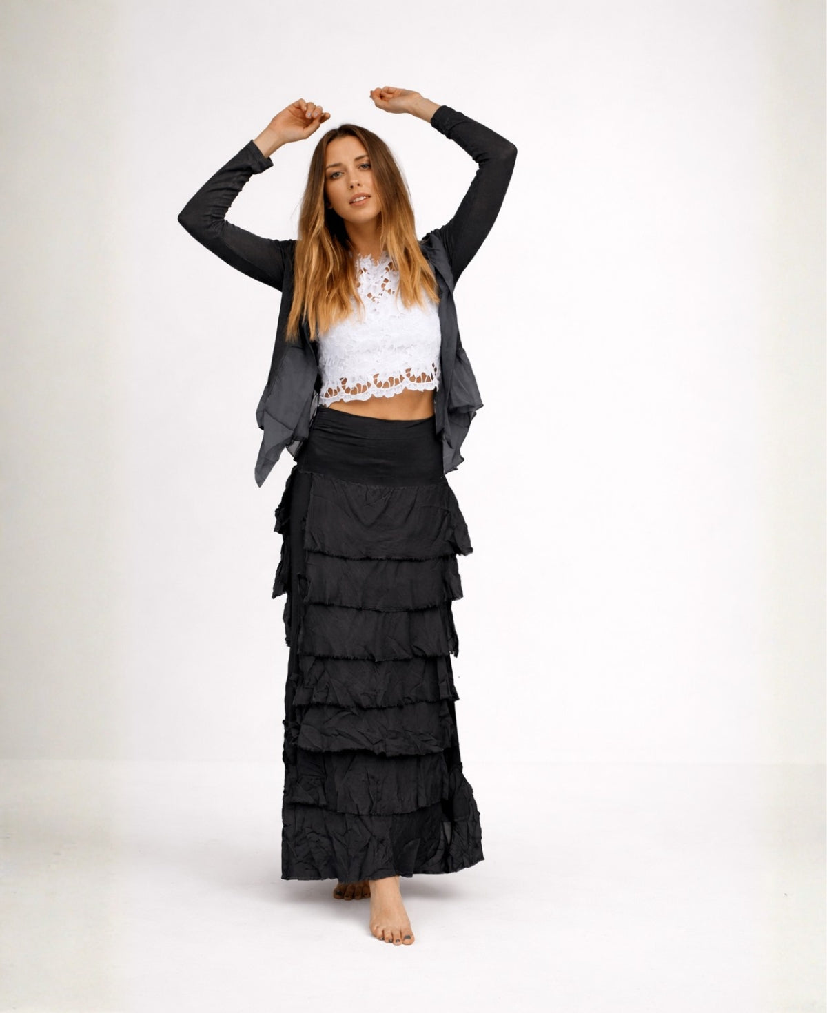 Front view of black Silk Blend Feather Skirt Dress styled as a skirt with tiered silk blend layers and soft drape