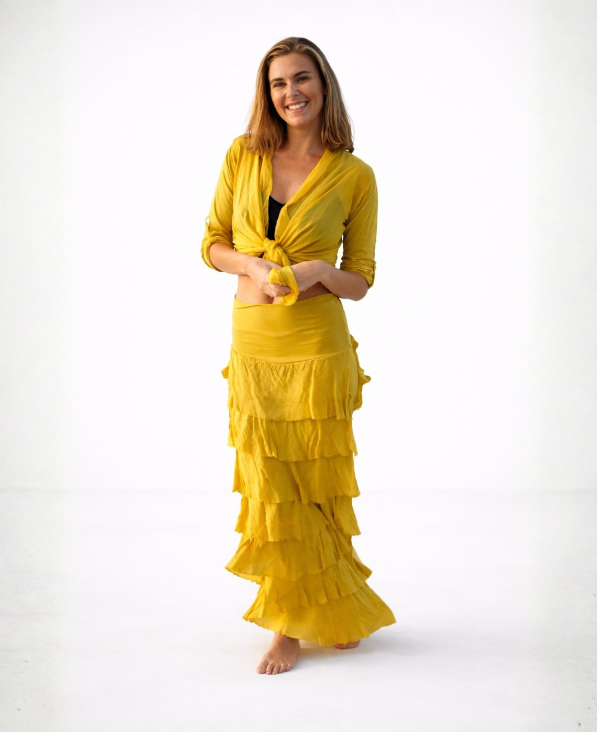 Front view of Dijon Silk Blend Feather Skirt Dress showing soft mustard tone with layered silk panels and stretch waist