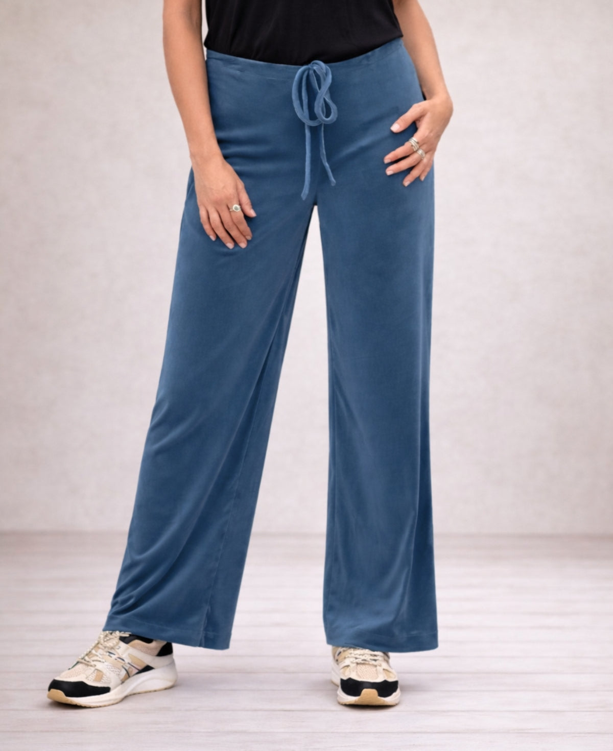 Blue teal Marshmallow Lounge Pants made of ultra-soft, lush chenille with an iridescent finish, blending cozy comfort with a stylish, laid-back vibe.
