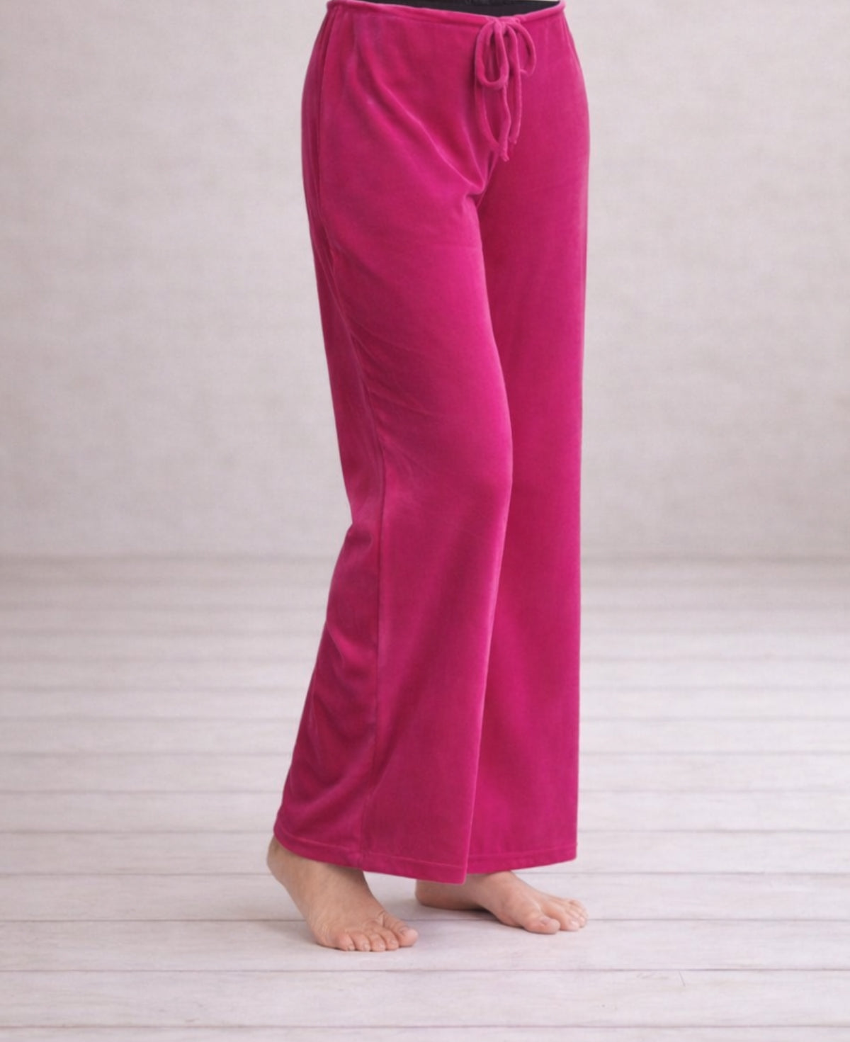 Hot pink Marshmallow Lounge Pants crafted from ultra-soft, lush chenille with a striking iridescent finish, combining cozy comfort with a vibrant, chic look for relaxing in style. 