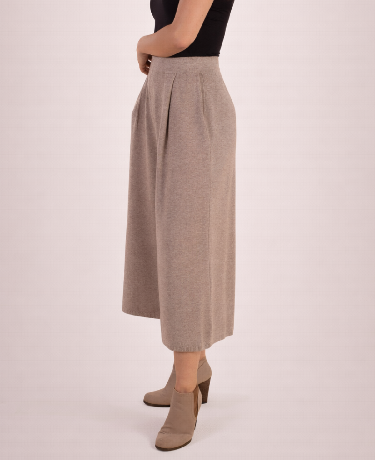 Angled detail view of mocka Winter Knit Culottes styled with a black tank top, highlighting the pleats and wide leg shape.