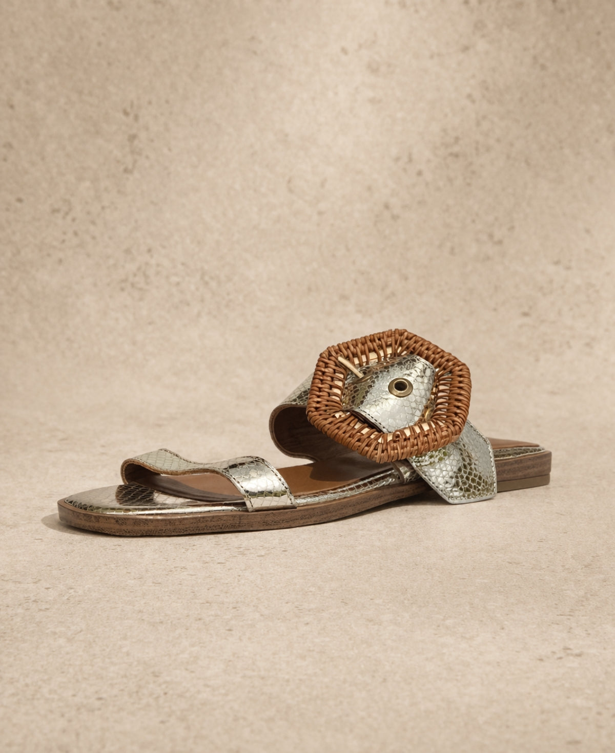 PIXY Gemma slide metallic sandal front angled view showing woven buckle