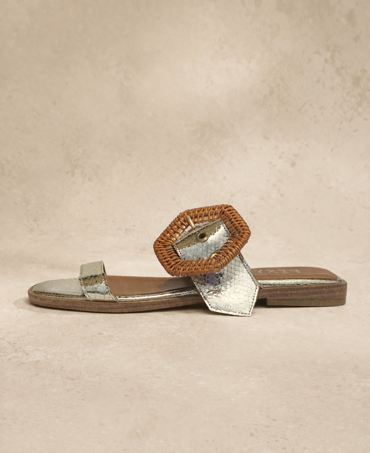 PIXY Gemma slide metallic sandal side view with woven buckle detail