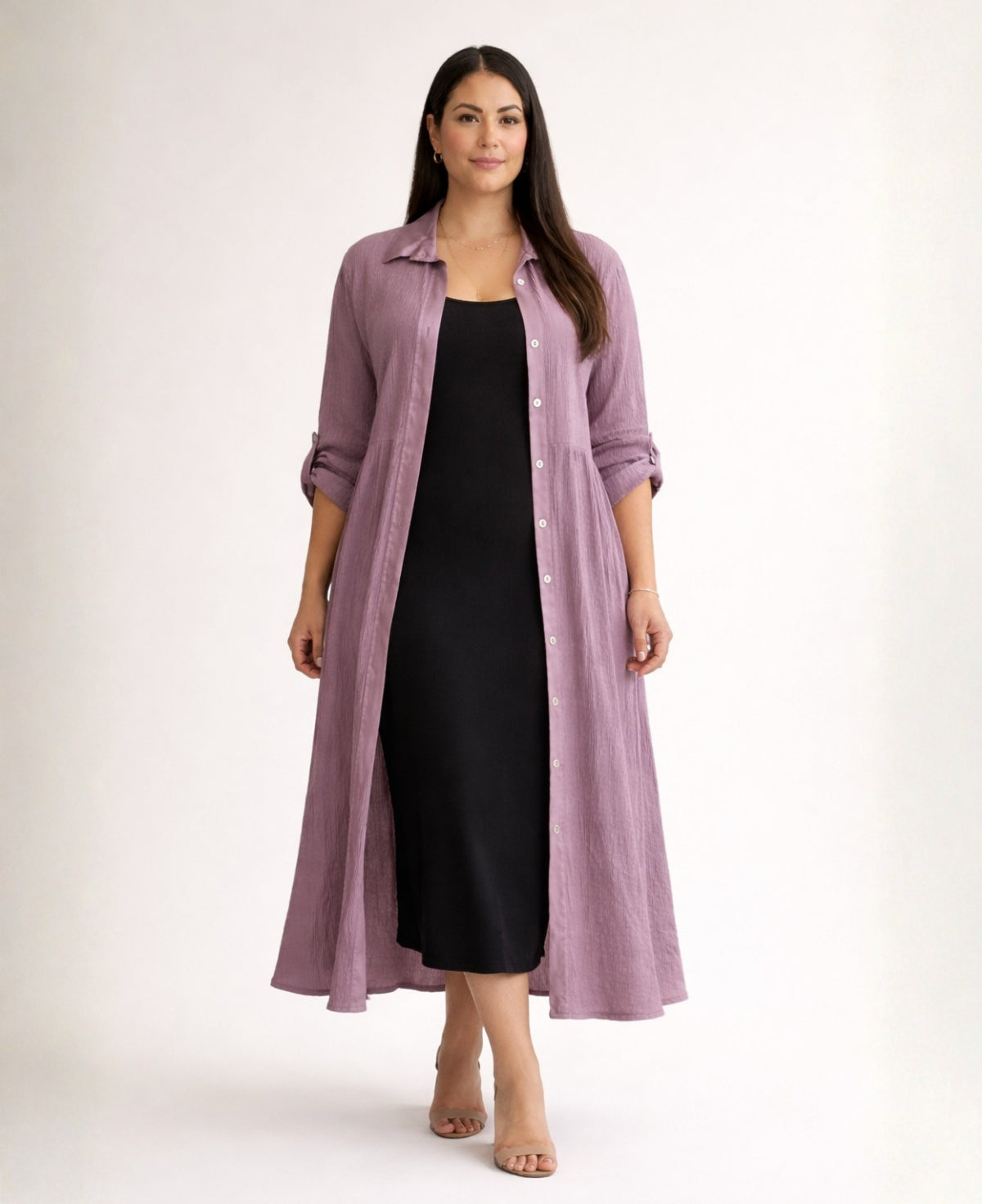 Roxberry Curvy Fit shirt dress in Mulberry worn open as a duster over black dress showing satin placket contrast and structured winter weight crinkle fabric.